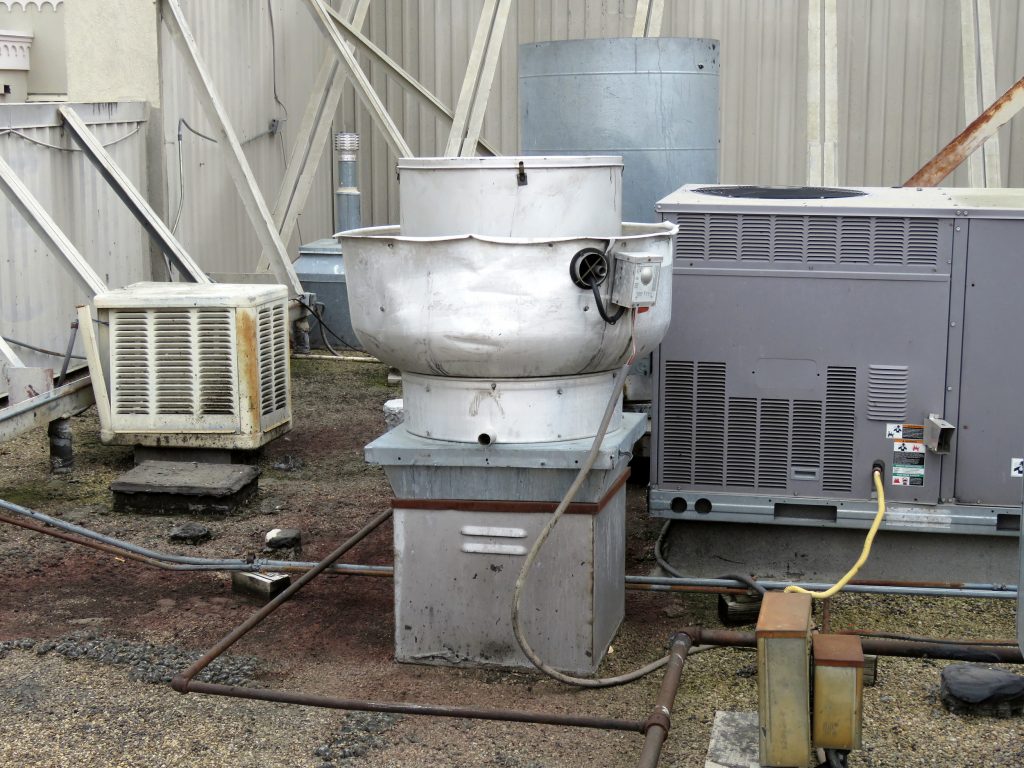 Roof ventilation: Exhaust fan unit over a restaurant kitchen.
